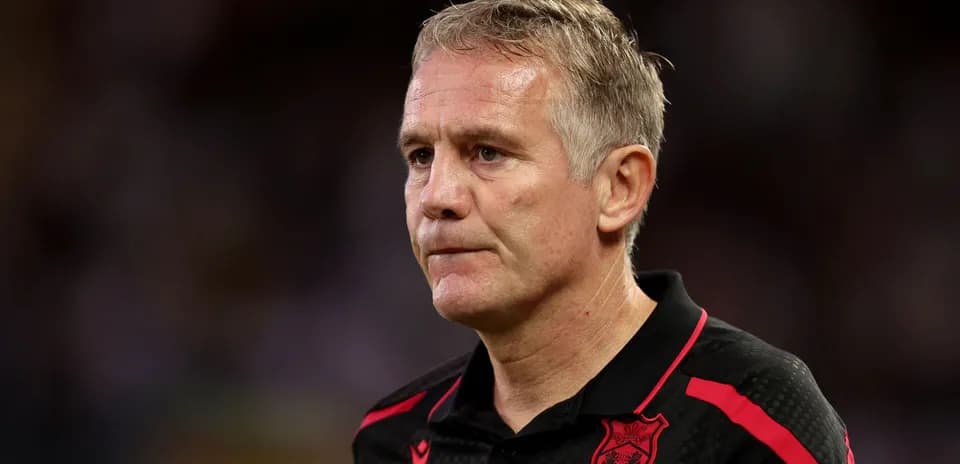 Coach looking on during a match