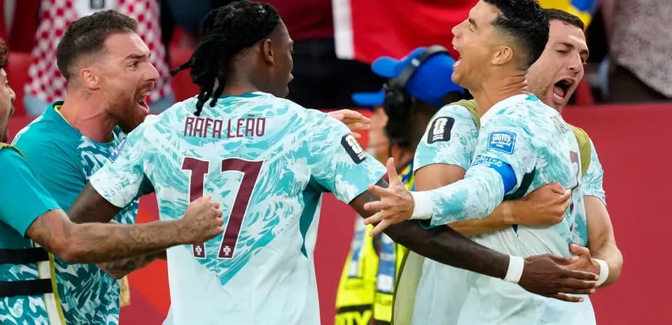 Portugal players celebrating a goal during match