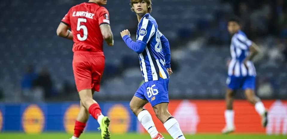 Player in blue jersey running during match action