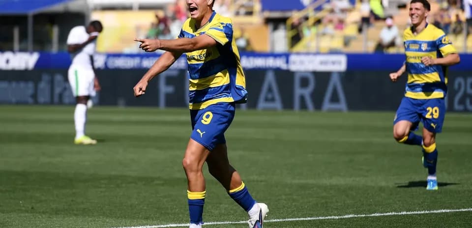 Parma player celebrating a goal during match