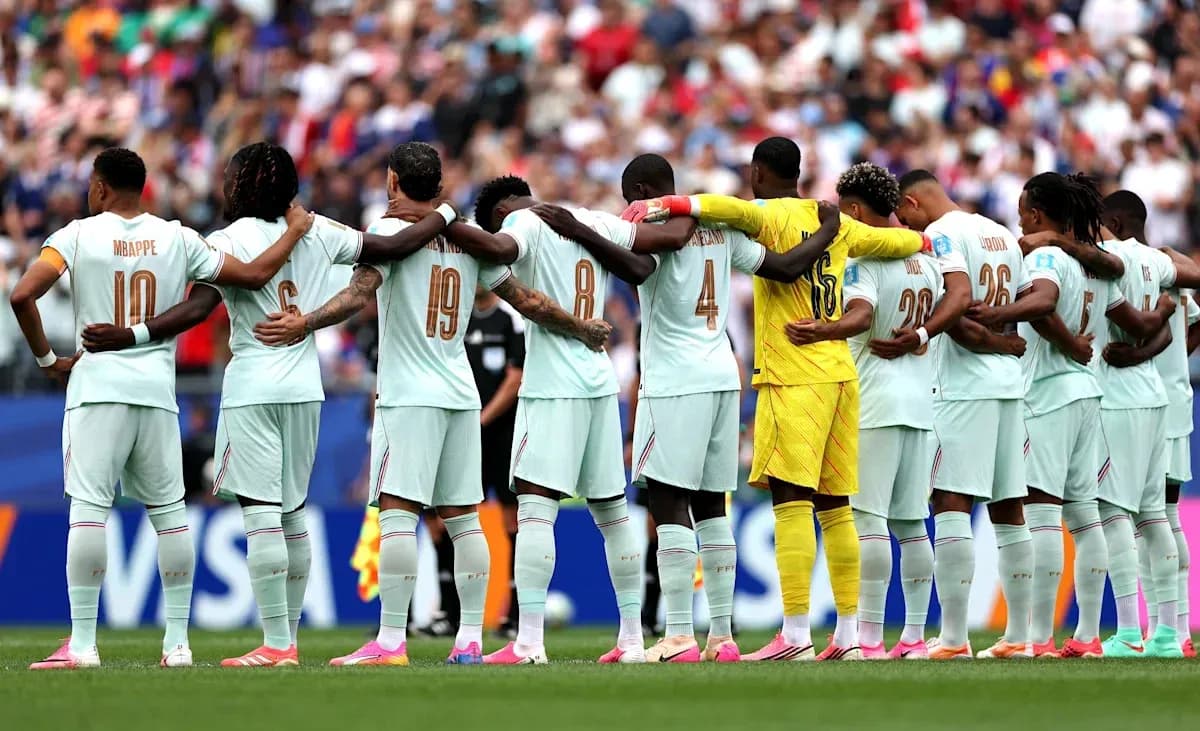 Team standing in solidarity before the match