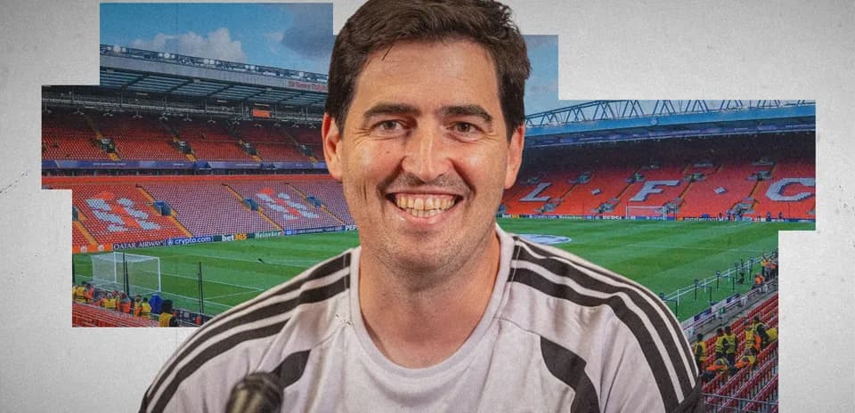 Smiling coach at Anfield stadium before match