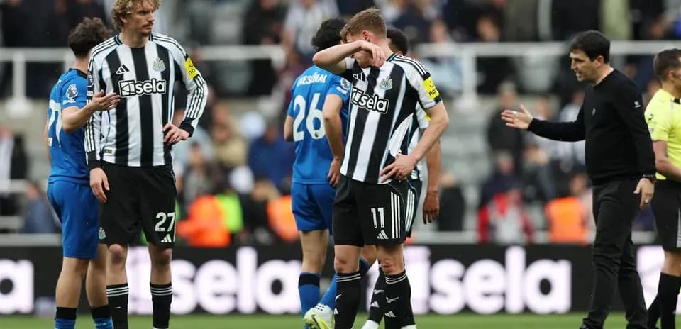 Newcastle players reacting after the match