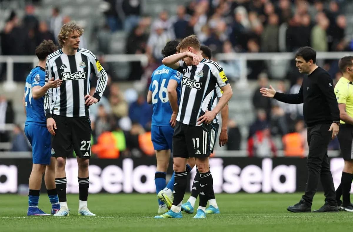 Newcastle players reacting after the match