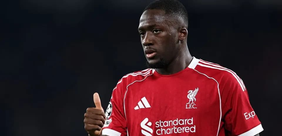 Player giving thumbs up in Liverpool jersey