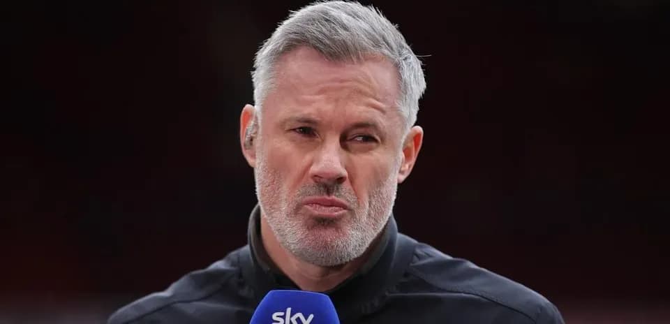 Sports commentator speaking into microphone on set