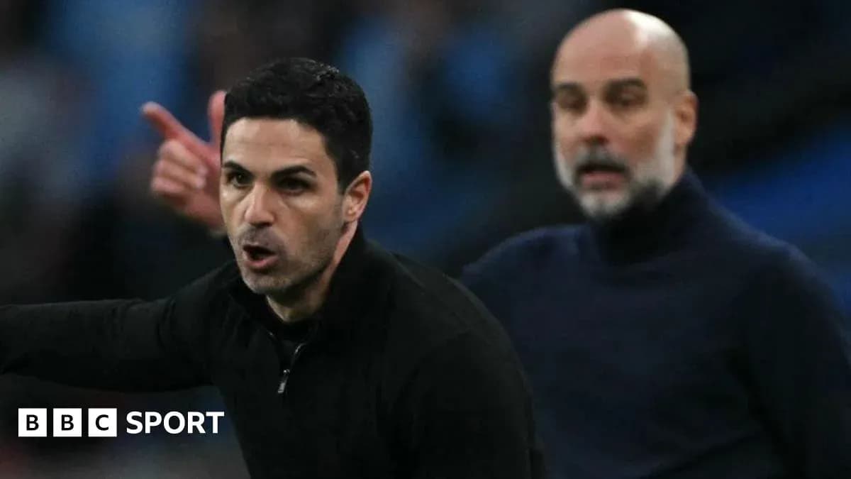 Two football managers on the sidelines during match