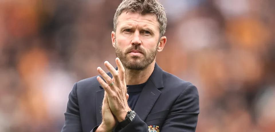 Coach clapping during match at stadium