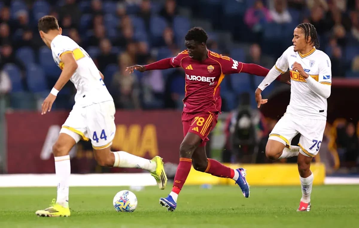 Player 78 dribbling past two defenders during match
