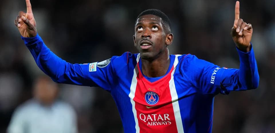 Player celebrating goal with raised finger at stadium