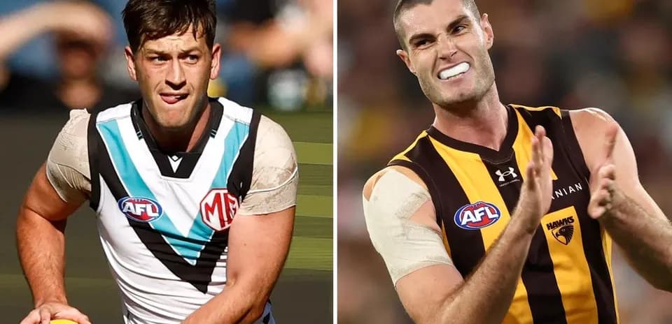 Two AFL players preparing for play on field