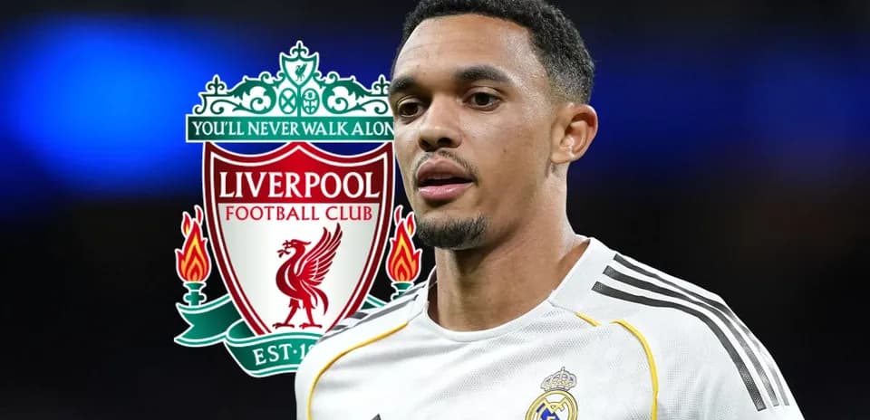Player in white jersey with Liverpool logo in background