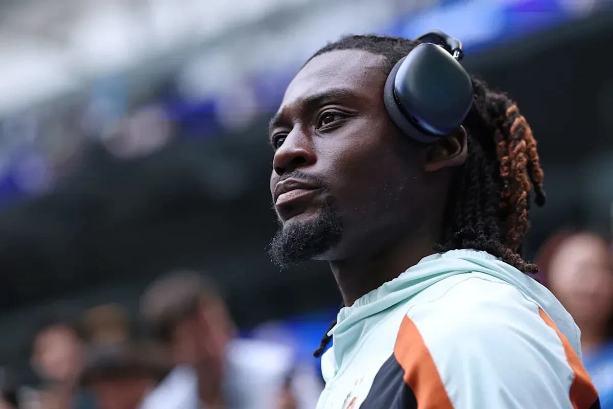 Player wearing headphones before the match