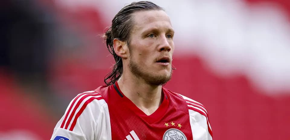 Player wearing Ajax jersey on the field