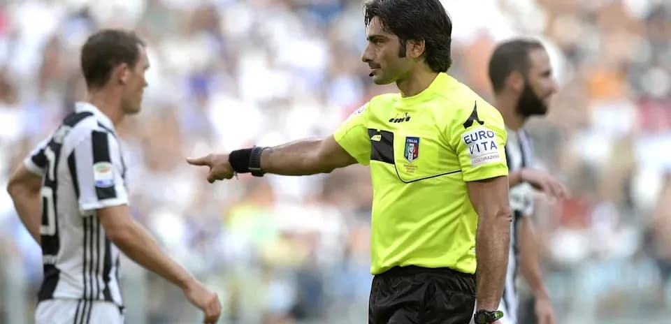 Referee signaling during a football match