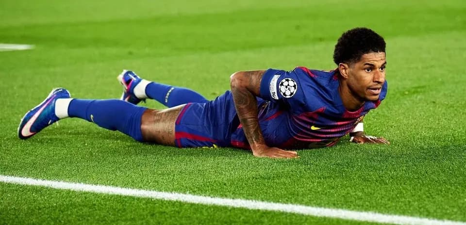 Player on the ground during a football match