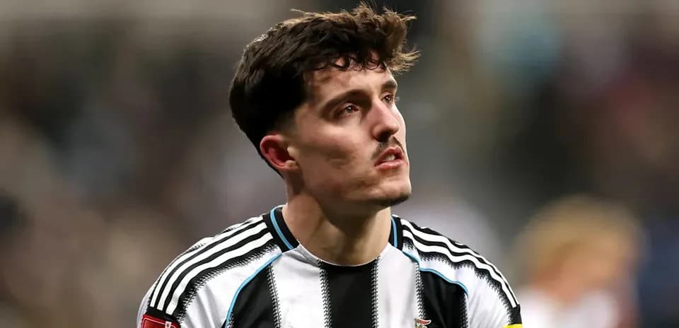Newcastle player with captain's armband during match