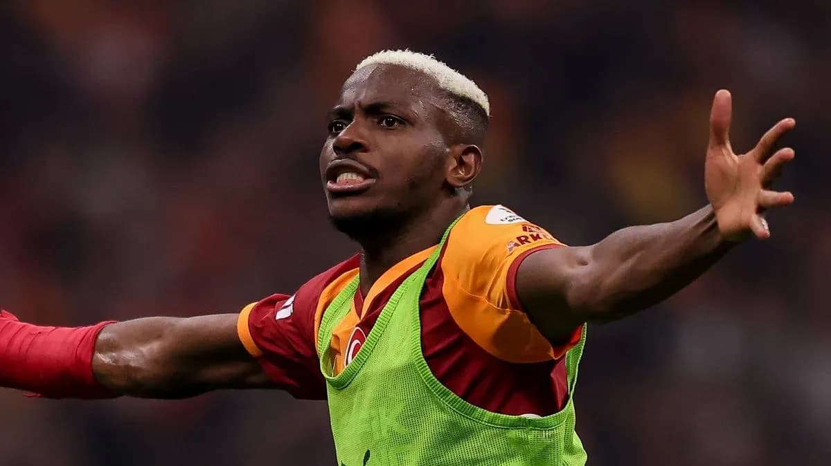 Player celebrating after scoring a goal for Galatasaray