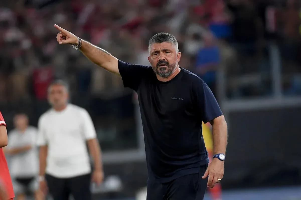 Coach gesturing from the sidelines during a match