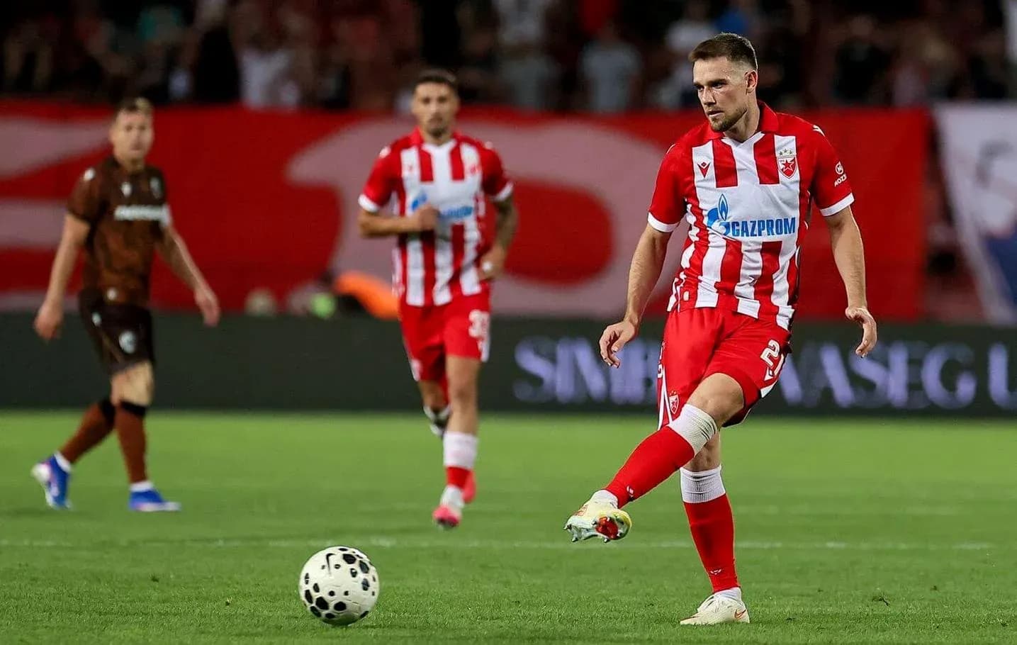 FK Crvena Zvezda player kicking the ball