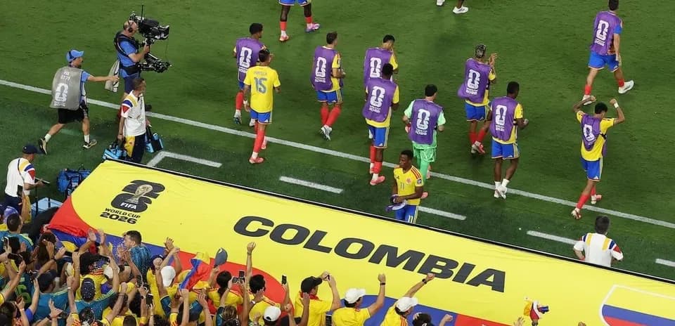 Colombian players celebrating with fans at World Cup