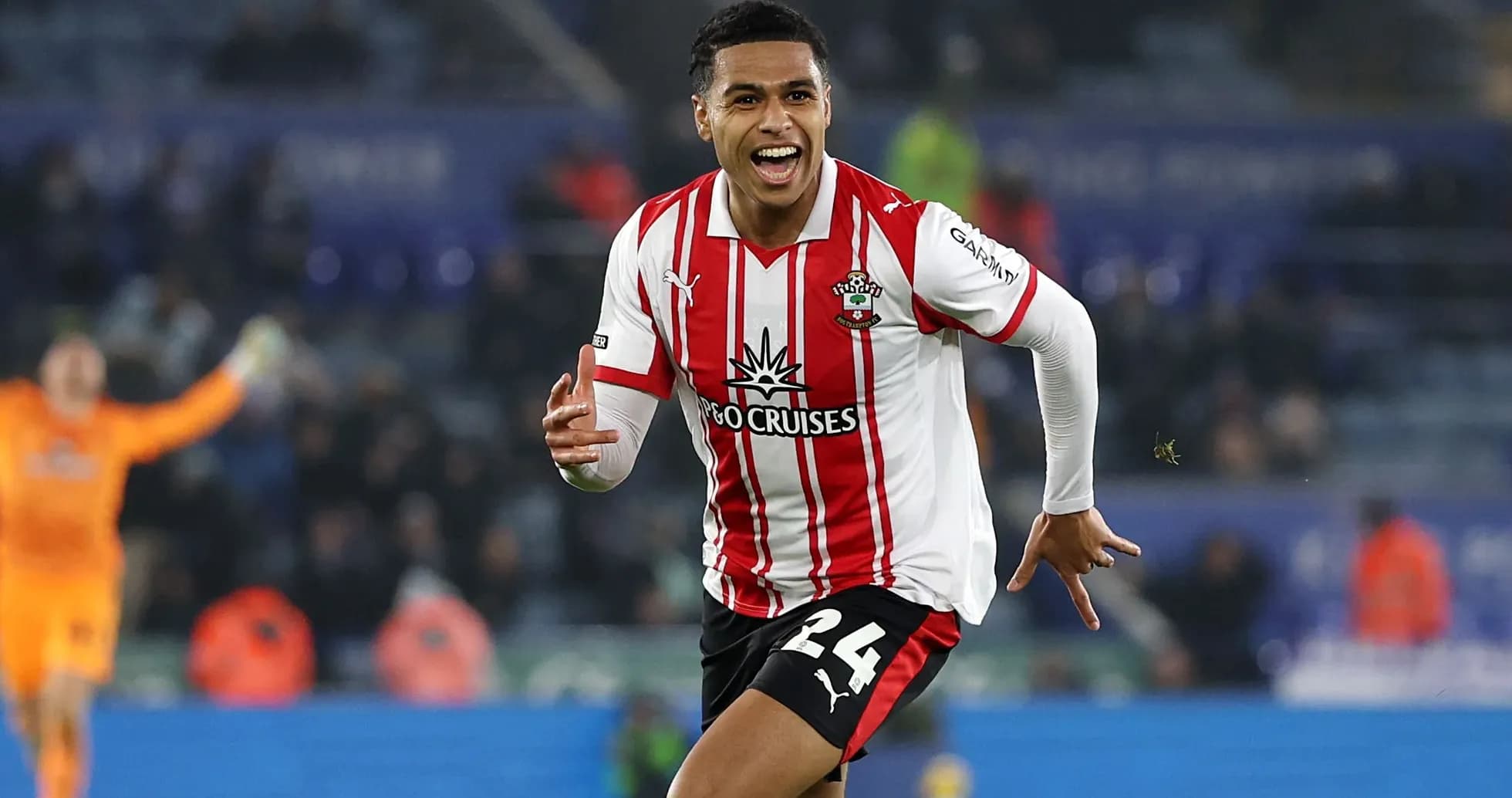 Player celebrating a goal on the pitch