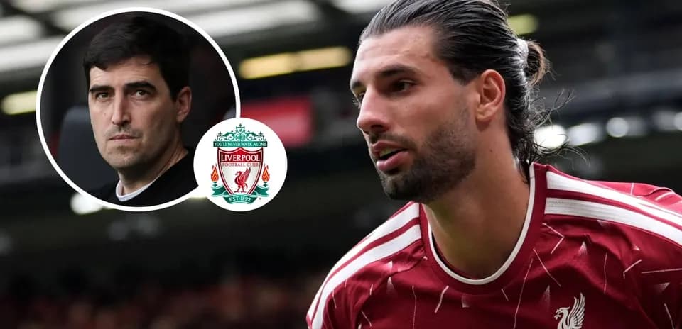 Liverpool player in action with coach and logo