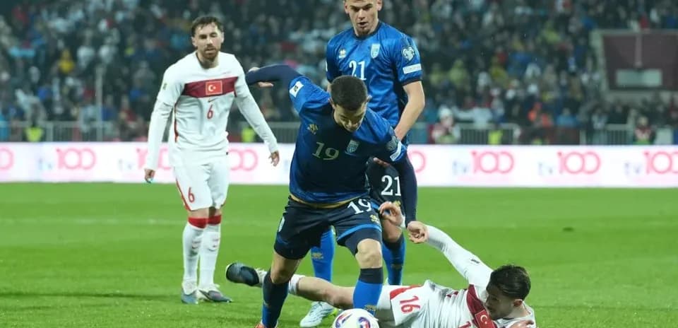 Player 19 tackling opponent on the field