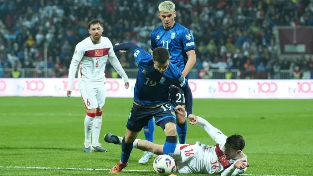 Player 19 tackling opponent on the field