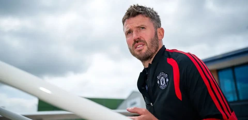 Man wearing Manchester United training gear outdoors