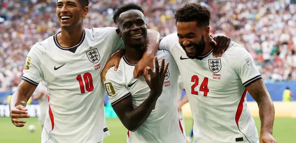 England players celebrating a goal during match