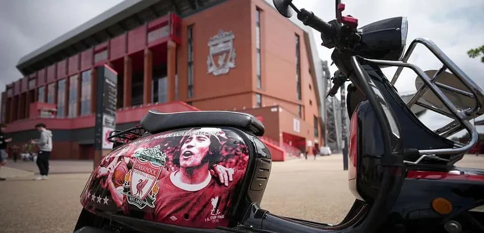 Scooter with Liverpool FC artwork outside stadium