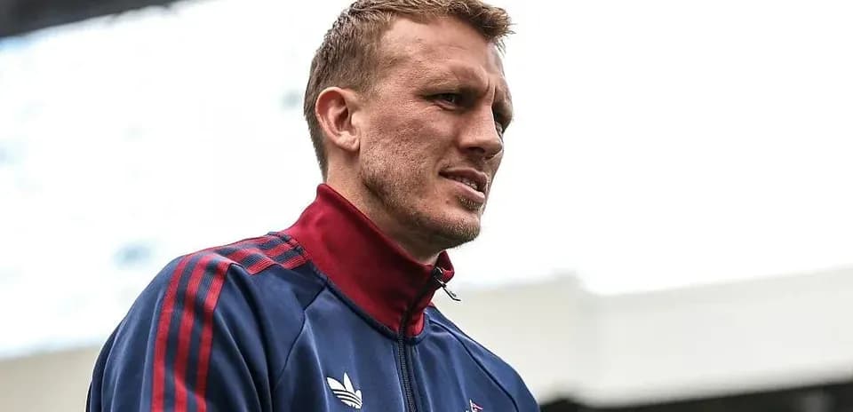 Player in training gear at the stadium
