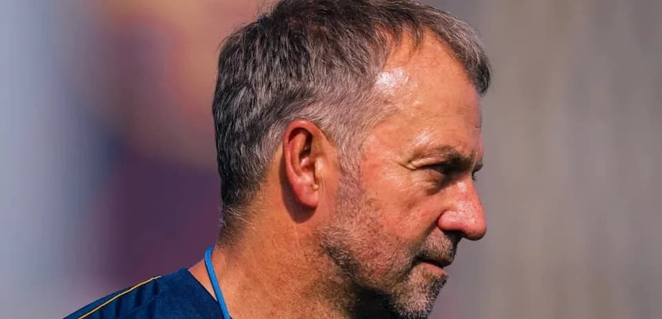 Coach observing during training session