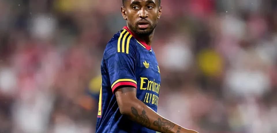 Player in blue kit during a football match