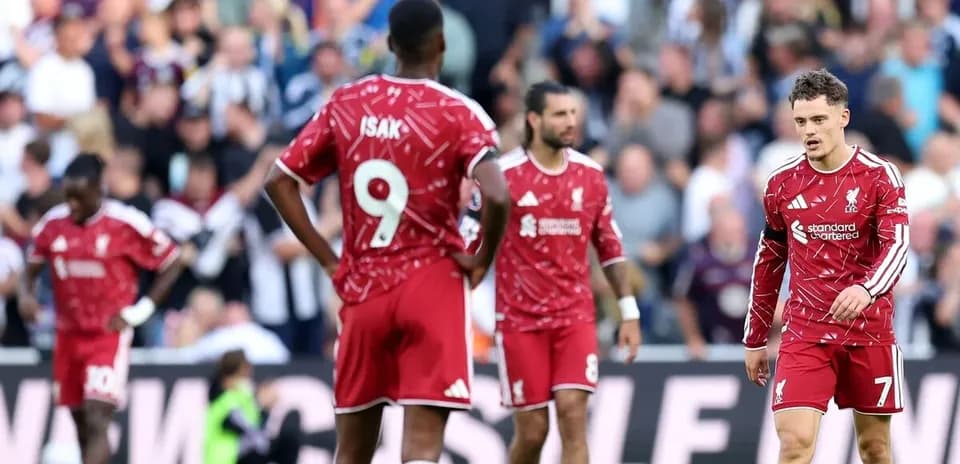 Liverpool players reacting during a match at Newcastle