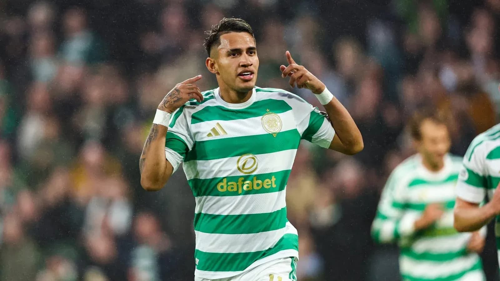 Player celebrating after scoring a goal for Celtic