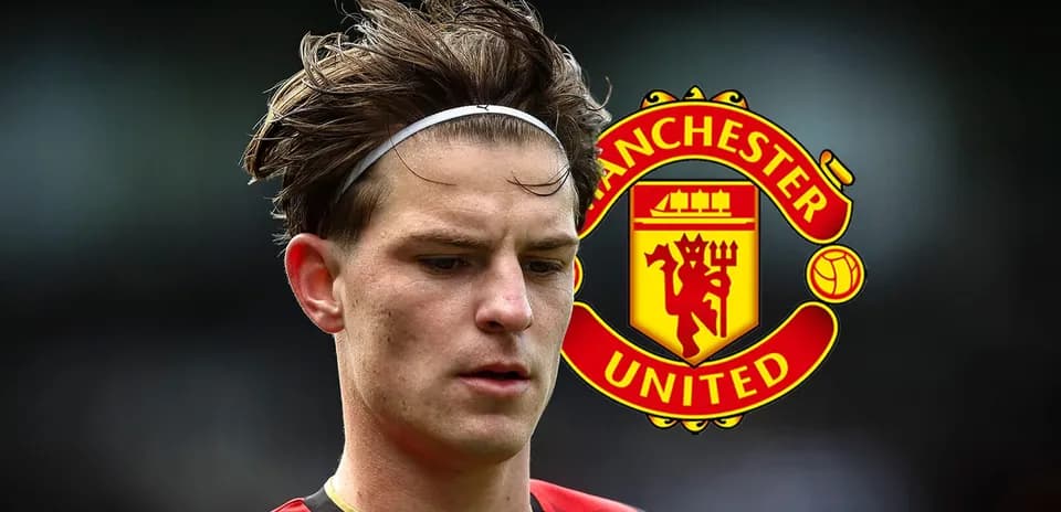 Player in red and black kit with Manchester United logo