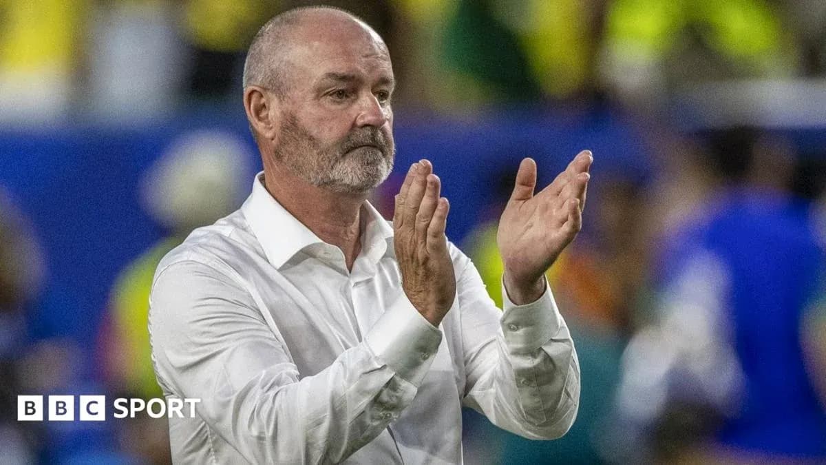 Coach applauding fans after the match