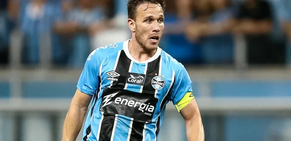 Player in blue and black jersey on the field
