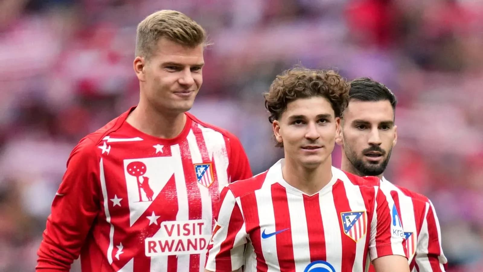 Atletico Madrid players walking on the pitch