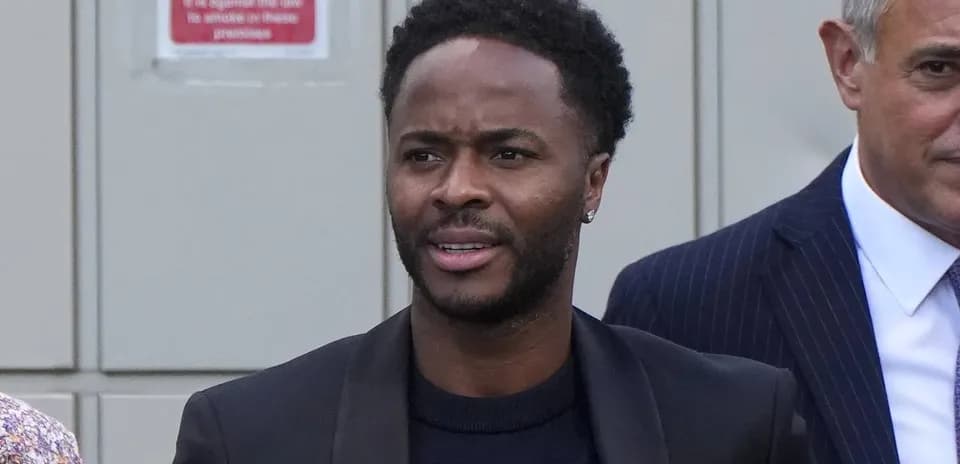 Man walking outdoors with a formal outfit