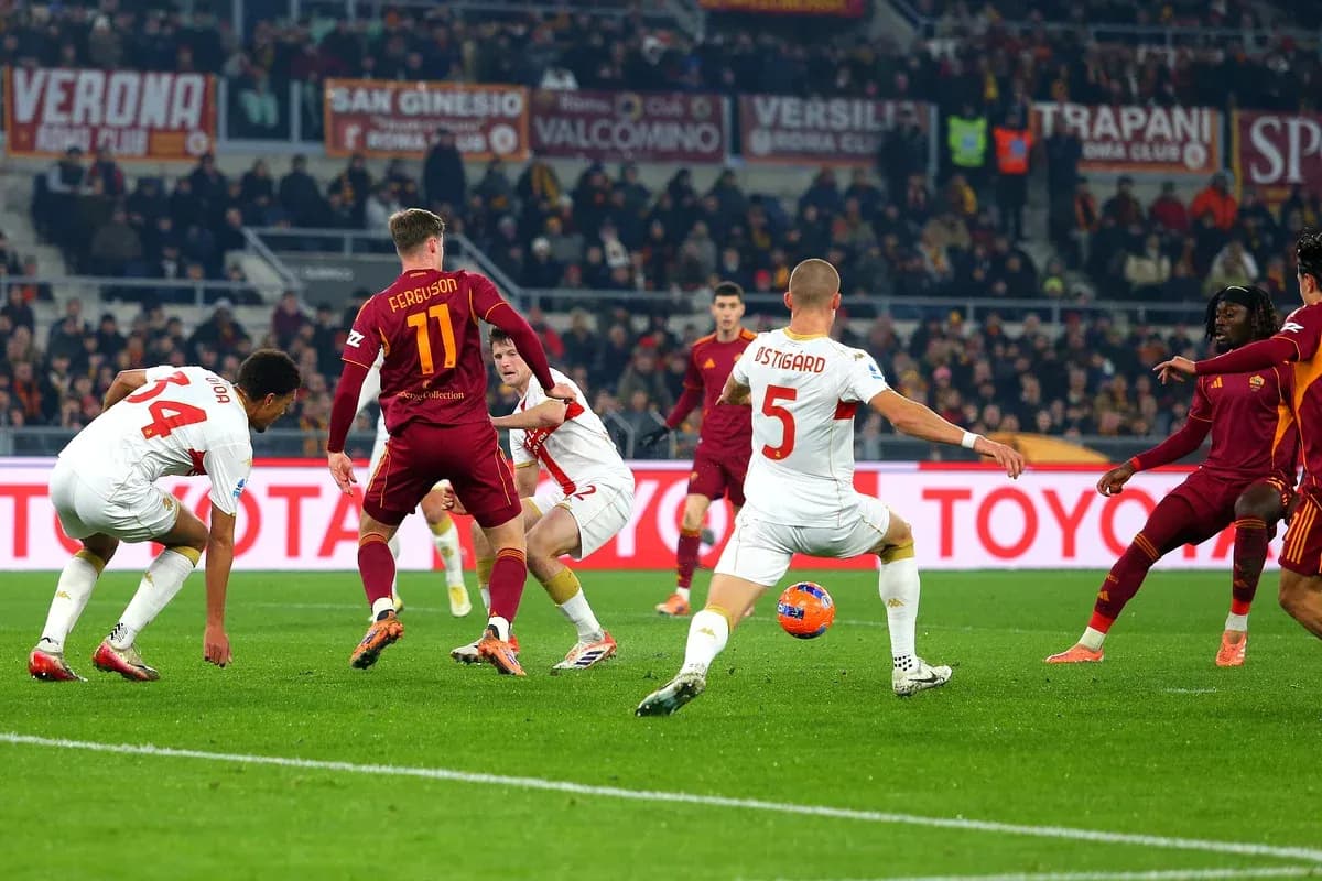 Genoa and AS Roma players in action
