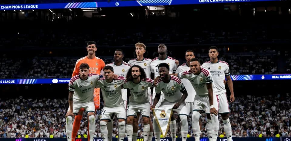 Real Madrid players posing for team photo before match