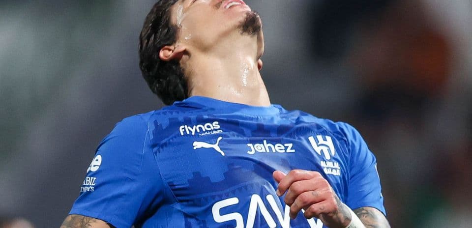 Player in blue jersey reacting during match