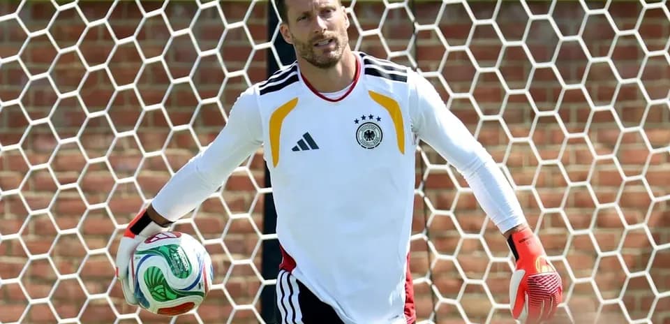 Goalkeeper holding a soccer ball in training session