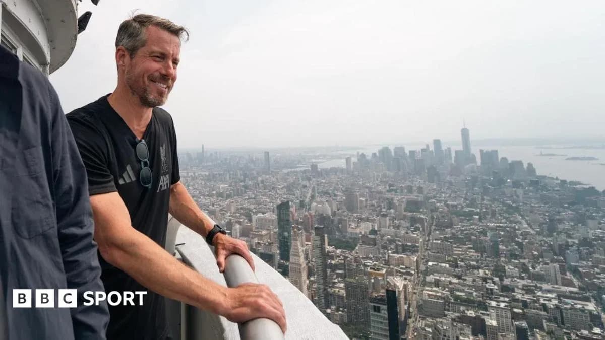 Person overlooking New York City skyline from height