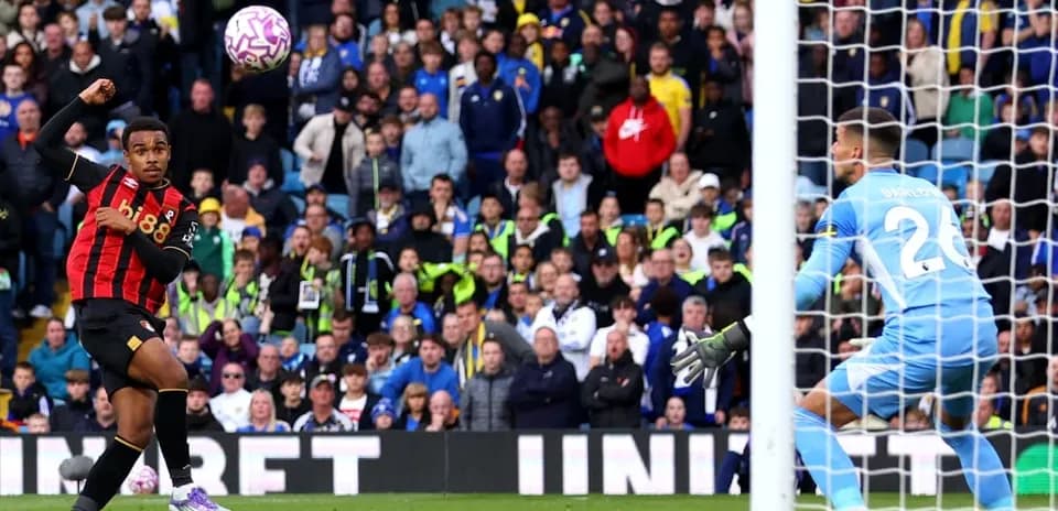 Bournemouth player shooting at Leeds goal