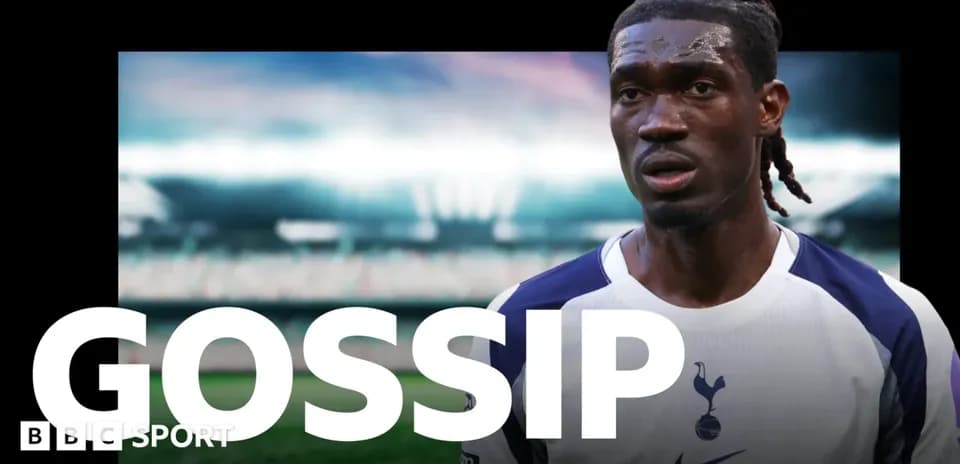 Player in Tottenham jersey with stadium background