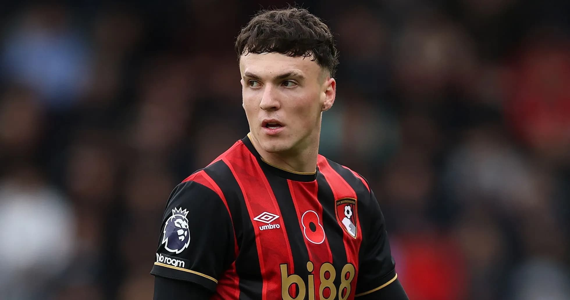 Bournemouth player during match in black and red kit